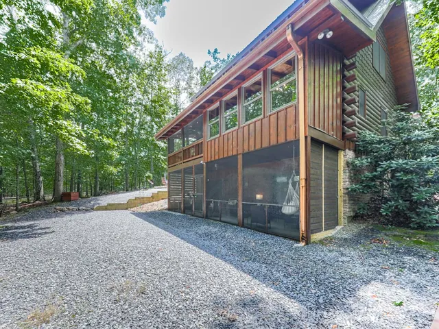 a view of front of house with a yard