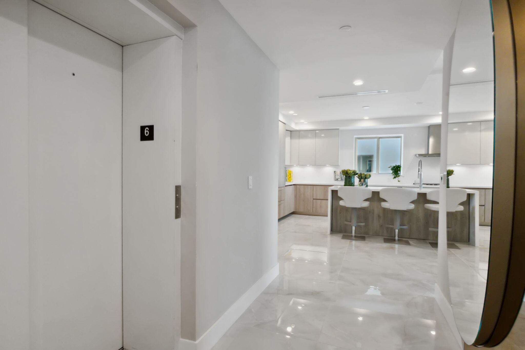 475 East Royal Palm Road, Unit 605 Boca Raton, FL 33432 - Photo 16 of 62 a view of a kitchen and dining room