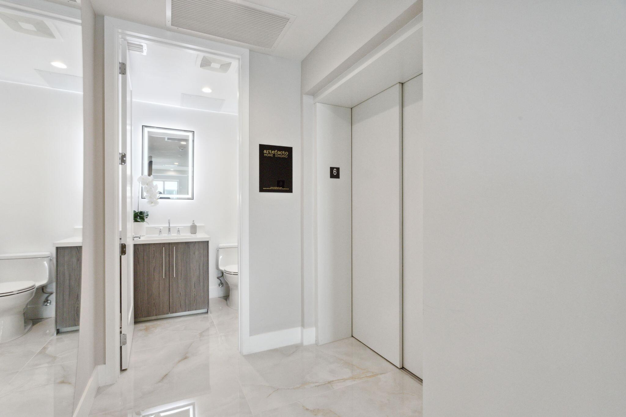 475 East Royal Palm Road, Unit 605 Boca Raton, FL 33432 - Photo 17 of 62 a view of a bathroom with sink mirror and bathtub
