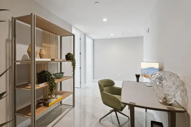 a bedroom with a bed and a cabinets