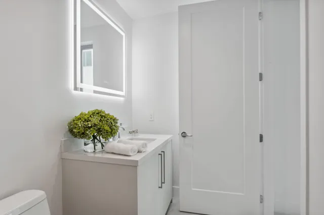 a view of a balcony with lake view and floor to ceiling window