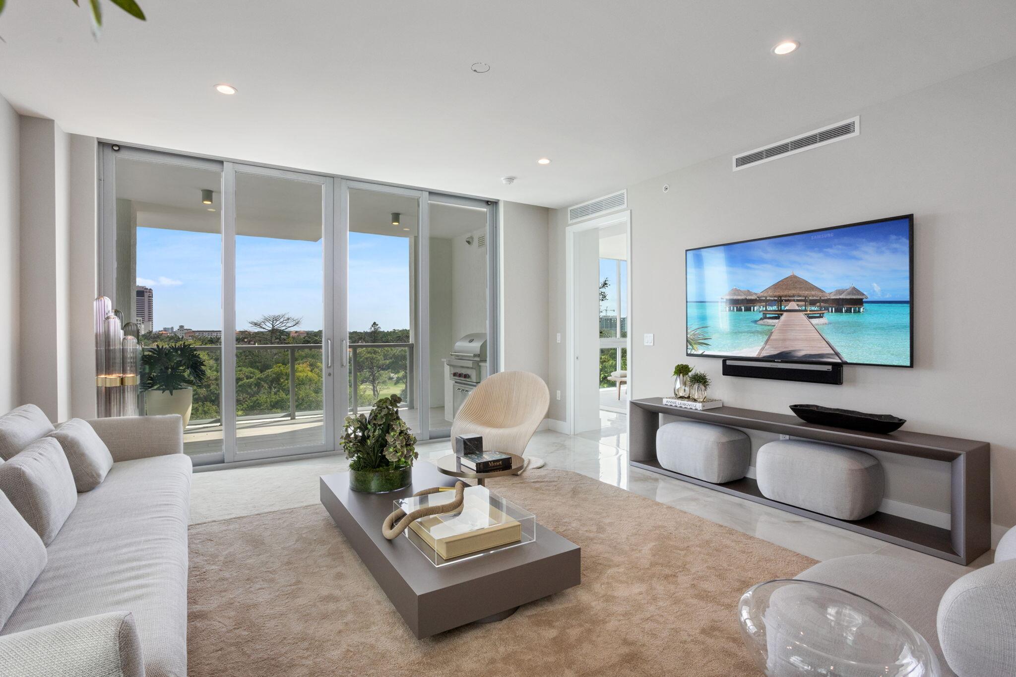 475 East Royal Palm Road, Unit 605 Boca Raton, FL 33432 - Photo 4 of 62 a living room with furniture and a large window