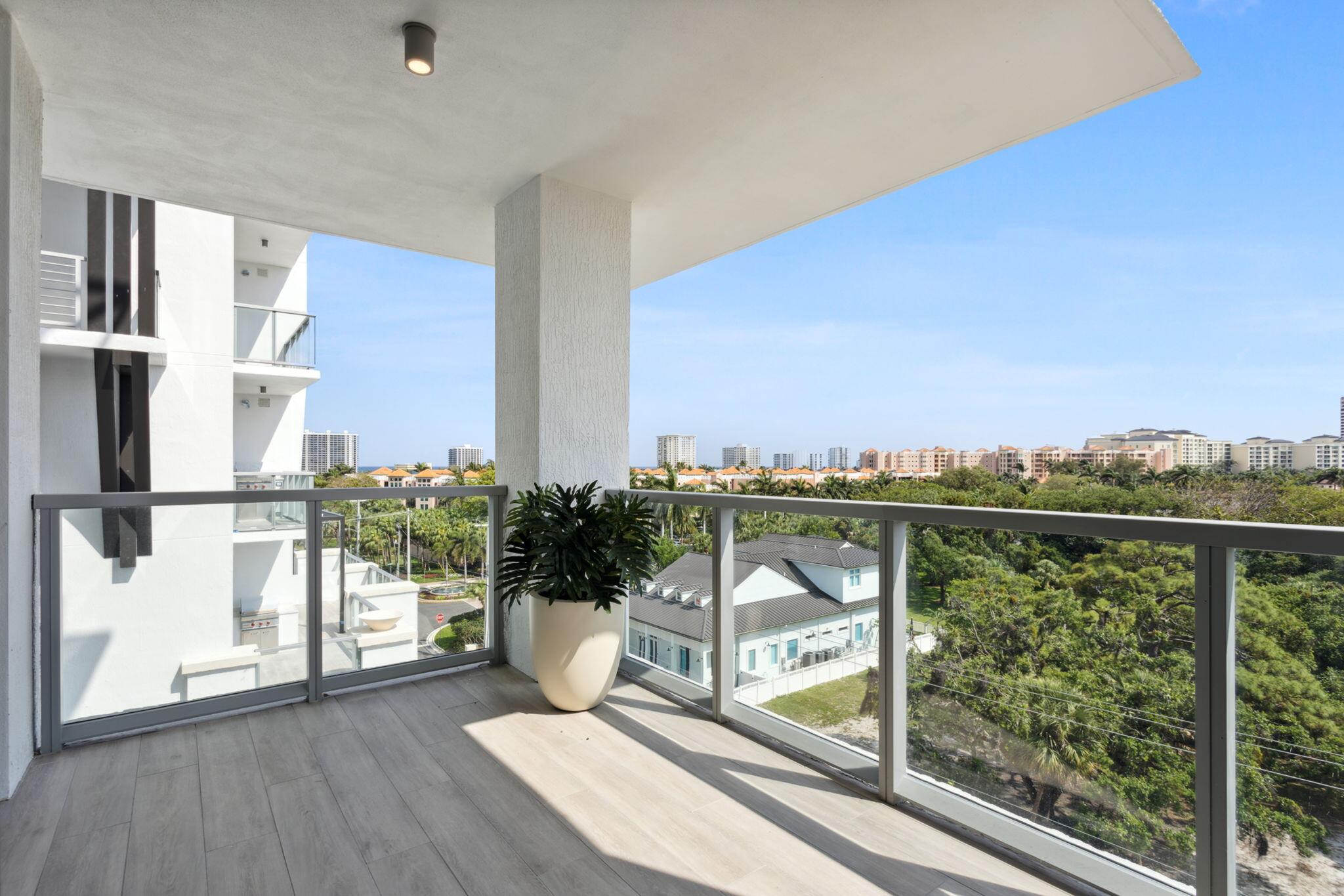 475 East Royal Palm Road, Unit 605 Boca Raton, FL 33432 - Photo 41 of 62 a view of a balcony with lake view and floor to ceiling window