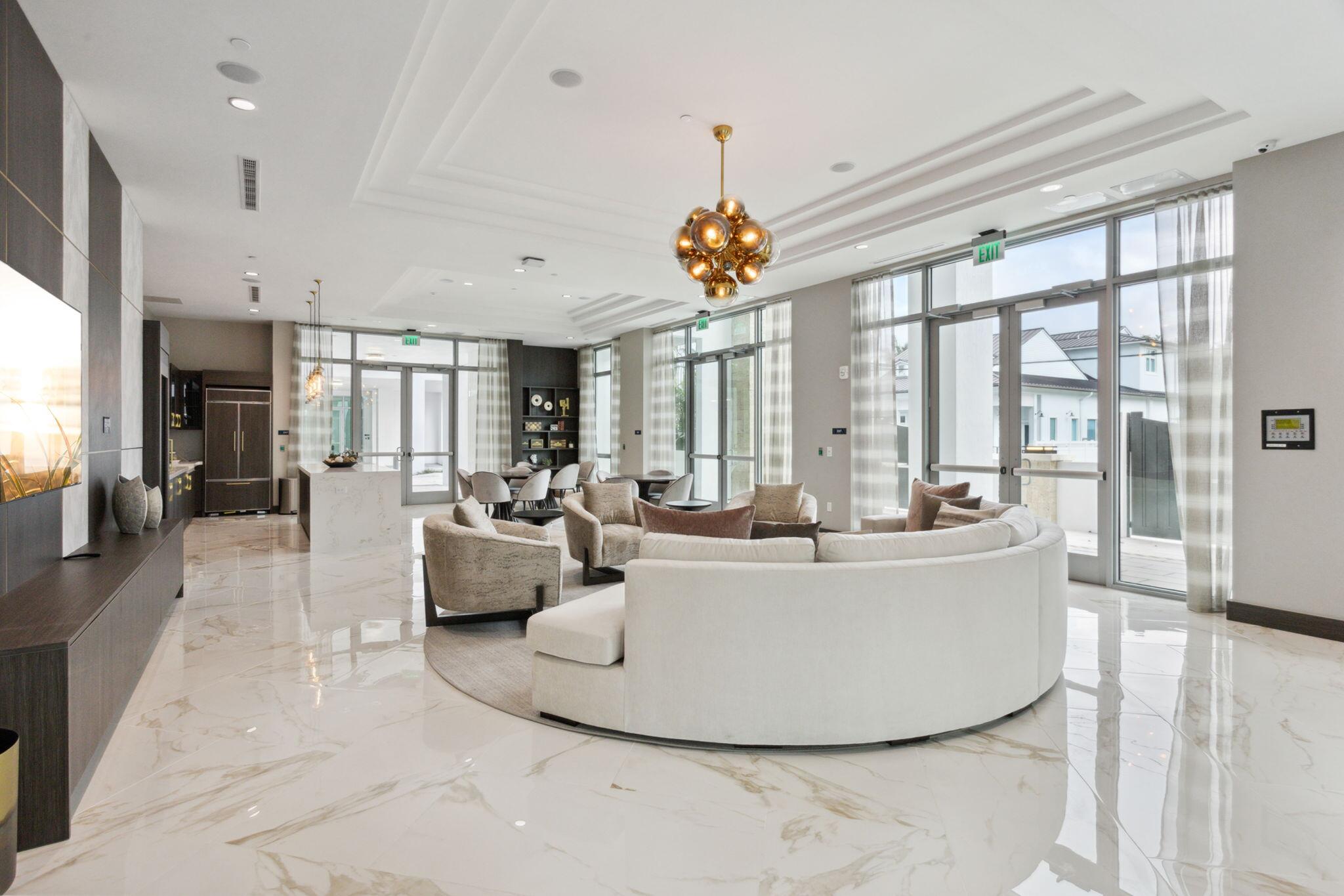 475 East Royal Palm Road, Unit 605 Boca Raton, FL 33432 - Photo 46 of 62 a living room with furniture and a large window