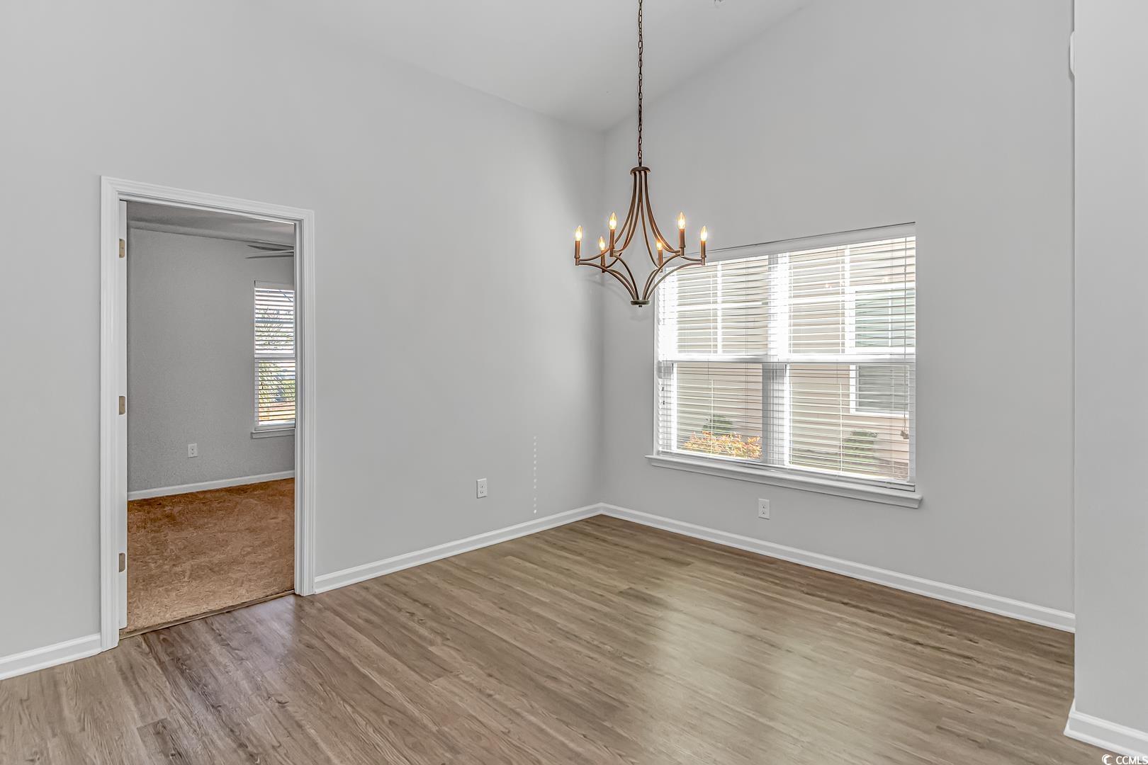 4348 Livorn Loop, Unit 4348 Myrtle Beach, SC 29579 - Photo 14 of 38 Unfurnished room featuring high vaulted ceiling, a