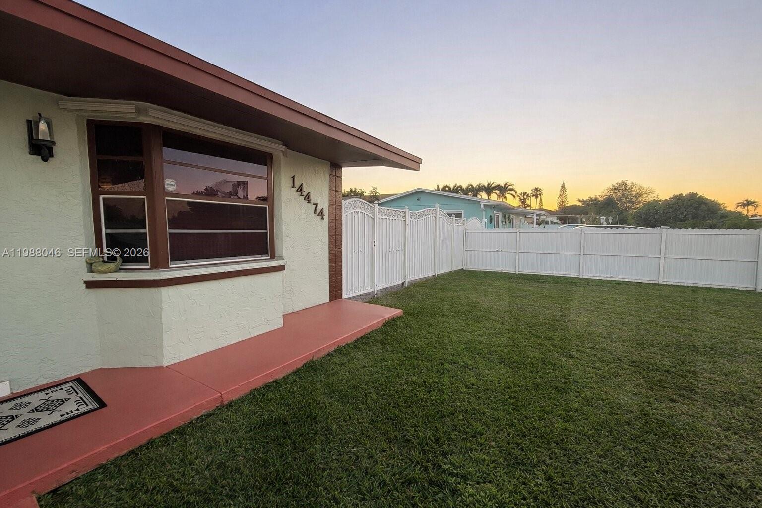 14474 Southwest 293rd Terrace Homestead, FL 33033 - Photo 3 of 20 a backyard of a house with lots of green space