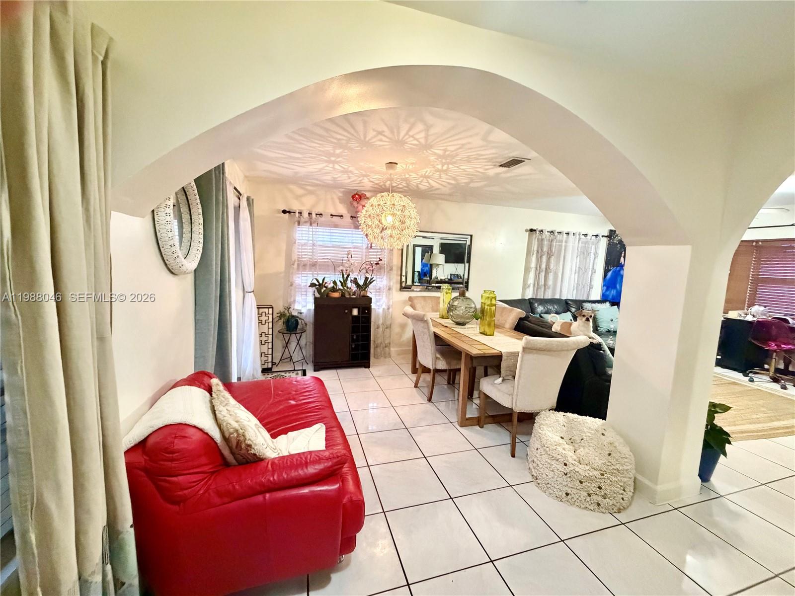 14474 Southwest 293rd Terrace Homestead, FL 33033 - Photo 5 of 20 a living room with furniture a rug and white walls