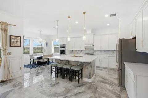 $980,000 | 984 Sterling Pine Place, Loxahatchee, FL 33470