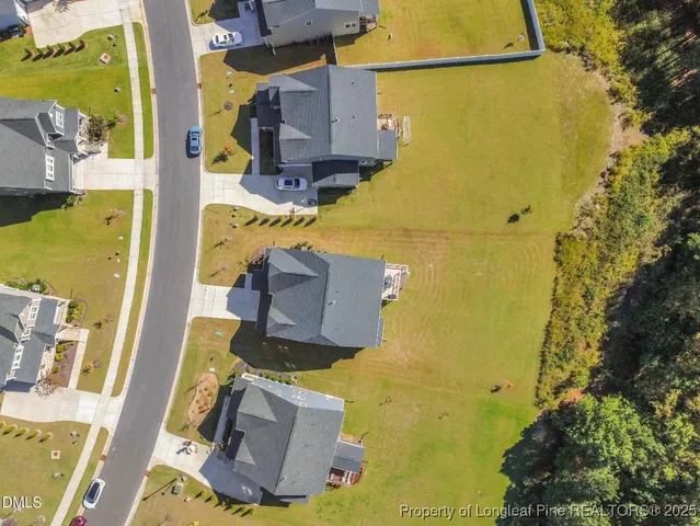 an aerial view of a house with garden