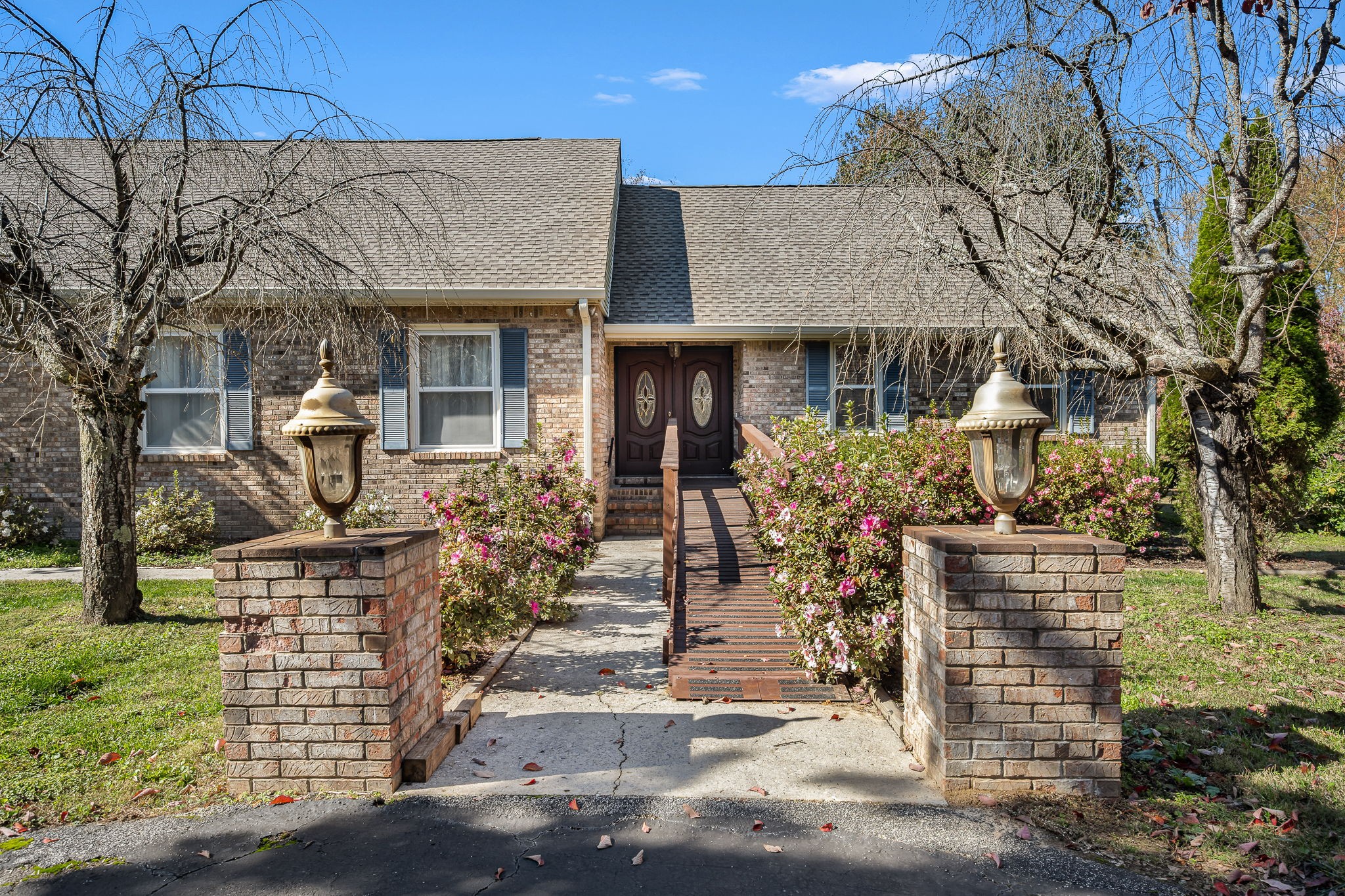 140 Motlow Road Tullahoma, TN 37388 - Photo 11 of 69 a front view of a house with a garden