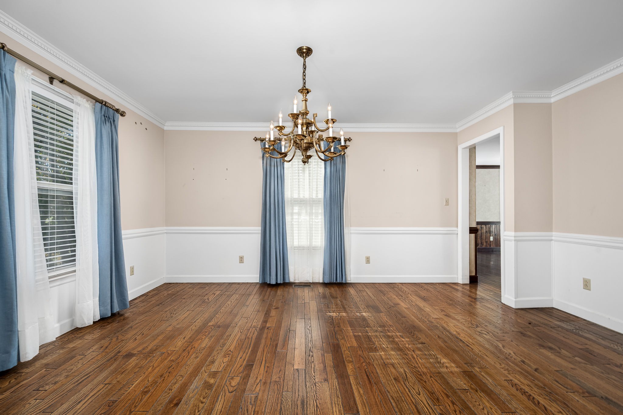 140 Motlow Road Tullahoma, TN 37388 - Photo 28 of 69 a view of a room with wooden floor and chandelier