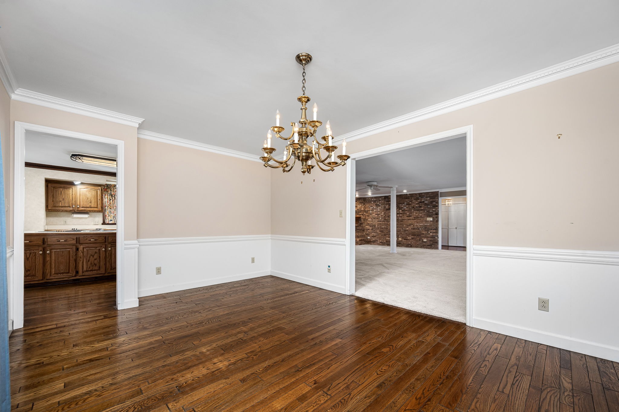140 Motlow Road Tullahoma, TN 37388 - Photo 29 of 69 a view of a room with wooden floor and chandelier