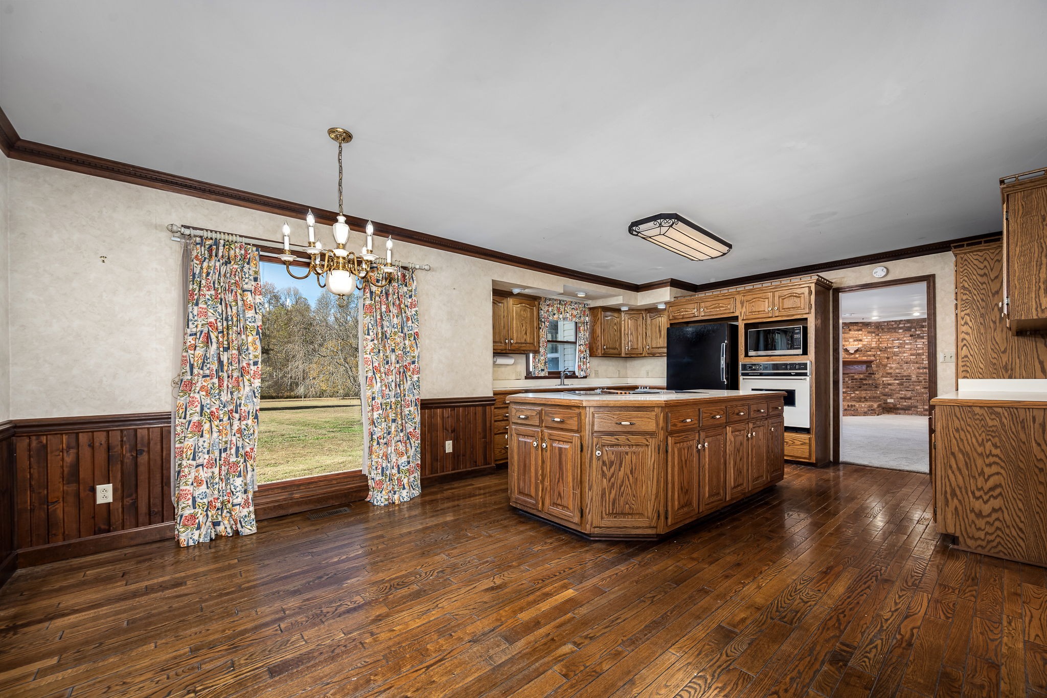 140 Motlow Road Tullahoma, TN 37388 - Photo 30 of 69 a living room with furniture and wooden floor