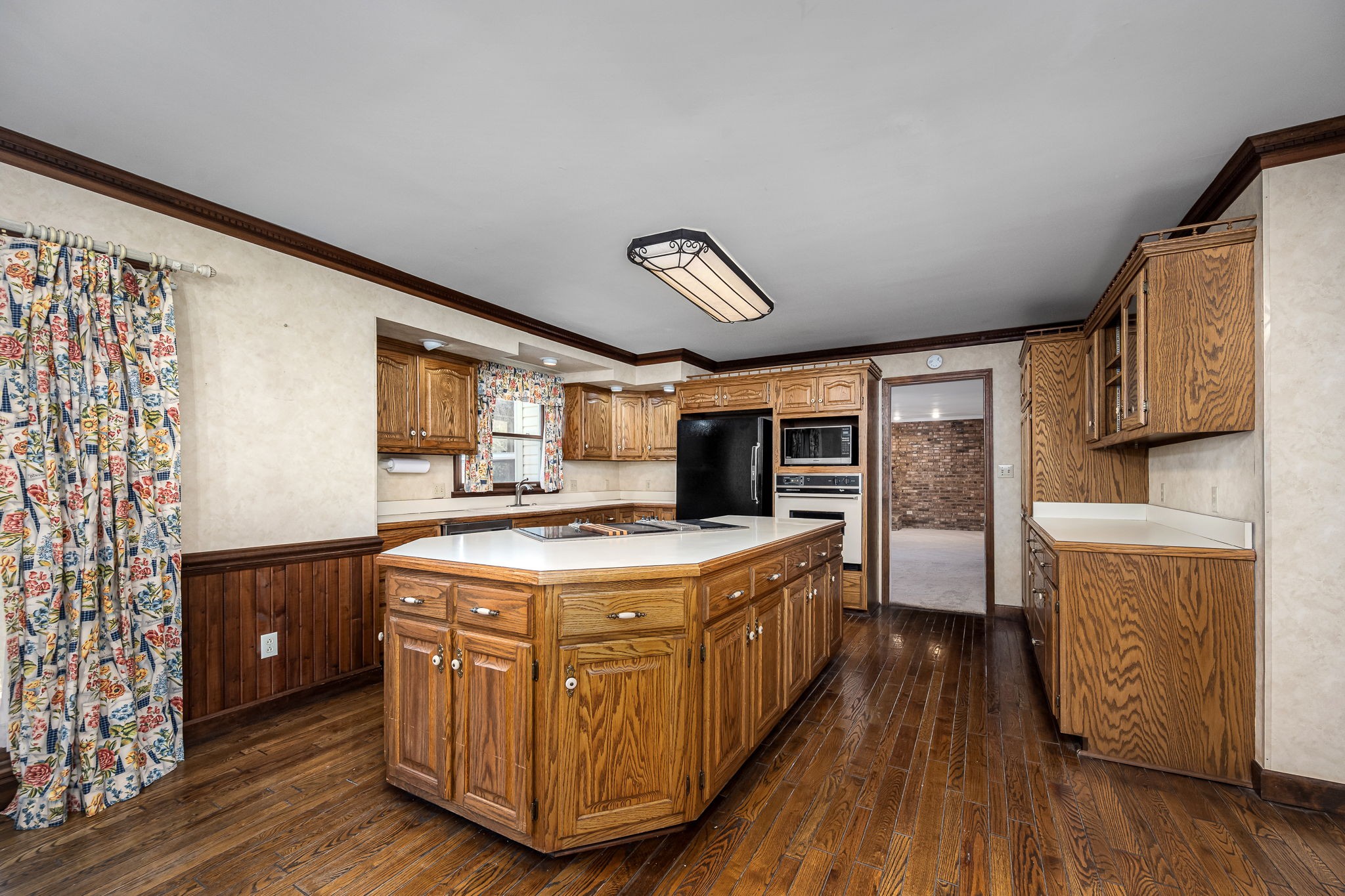 140 Motlow Road Tullahoma, TN 37388 - Photo 32 of 69 a kitchen with stainless steel appliances granite countertop a stove and a refrigerator