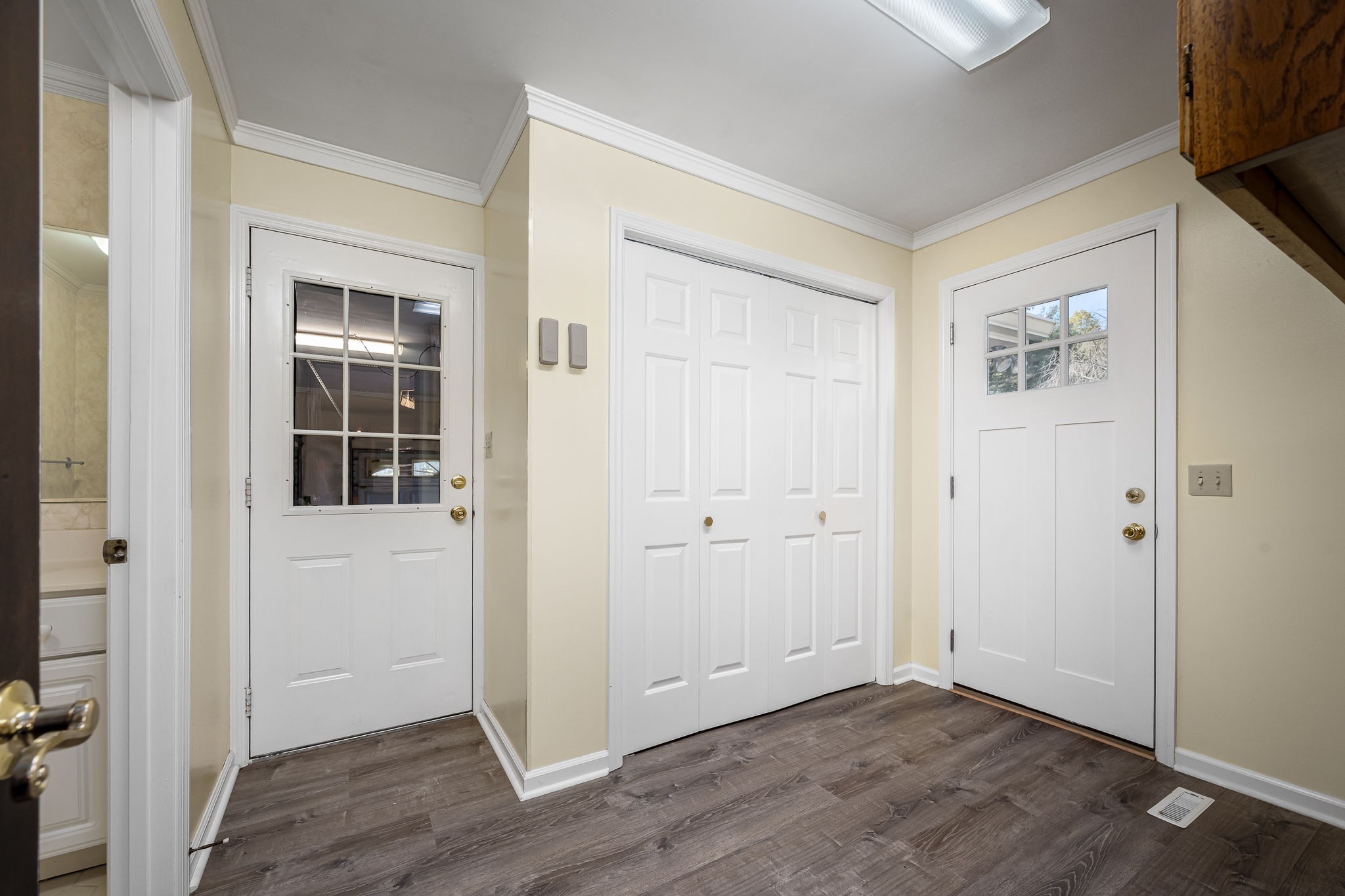 140 Motlow Road Tullahoma, TN 37388 - Photo 38 of 69 an empty room with wooden floor and windows