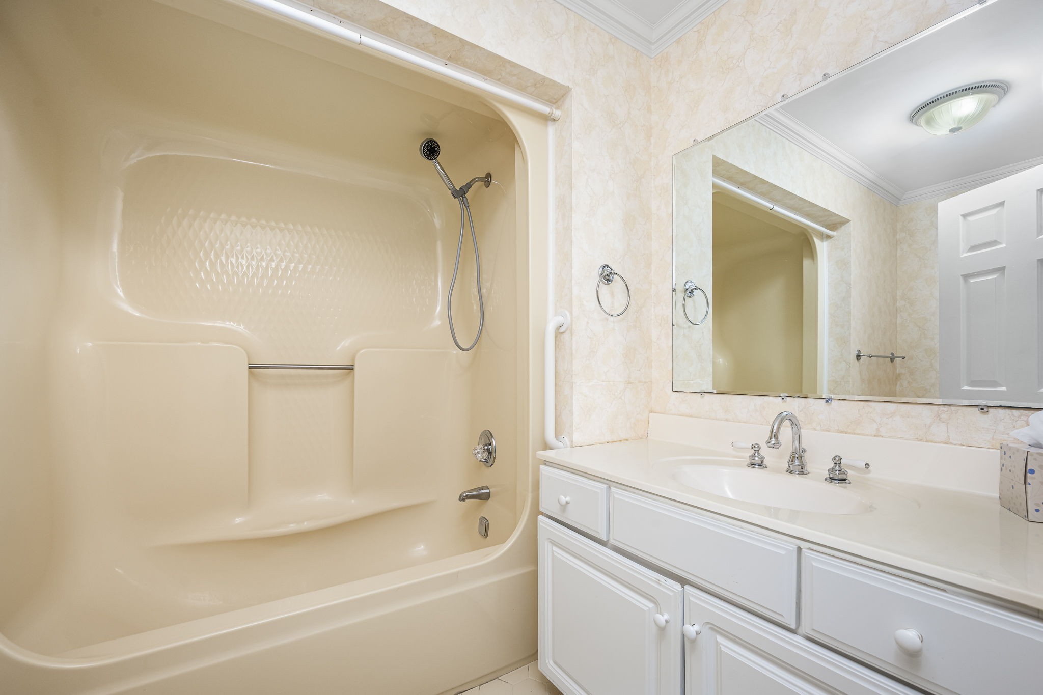 140 Motlow Road Tullahoma, TN 37388 - Photo 40 of 69 a bathroom with a granite countertop sink a toilet and shower