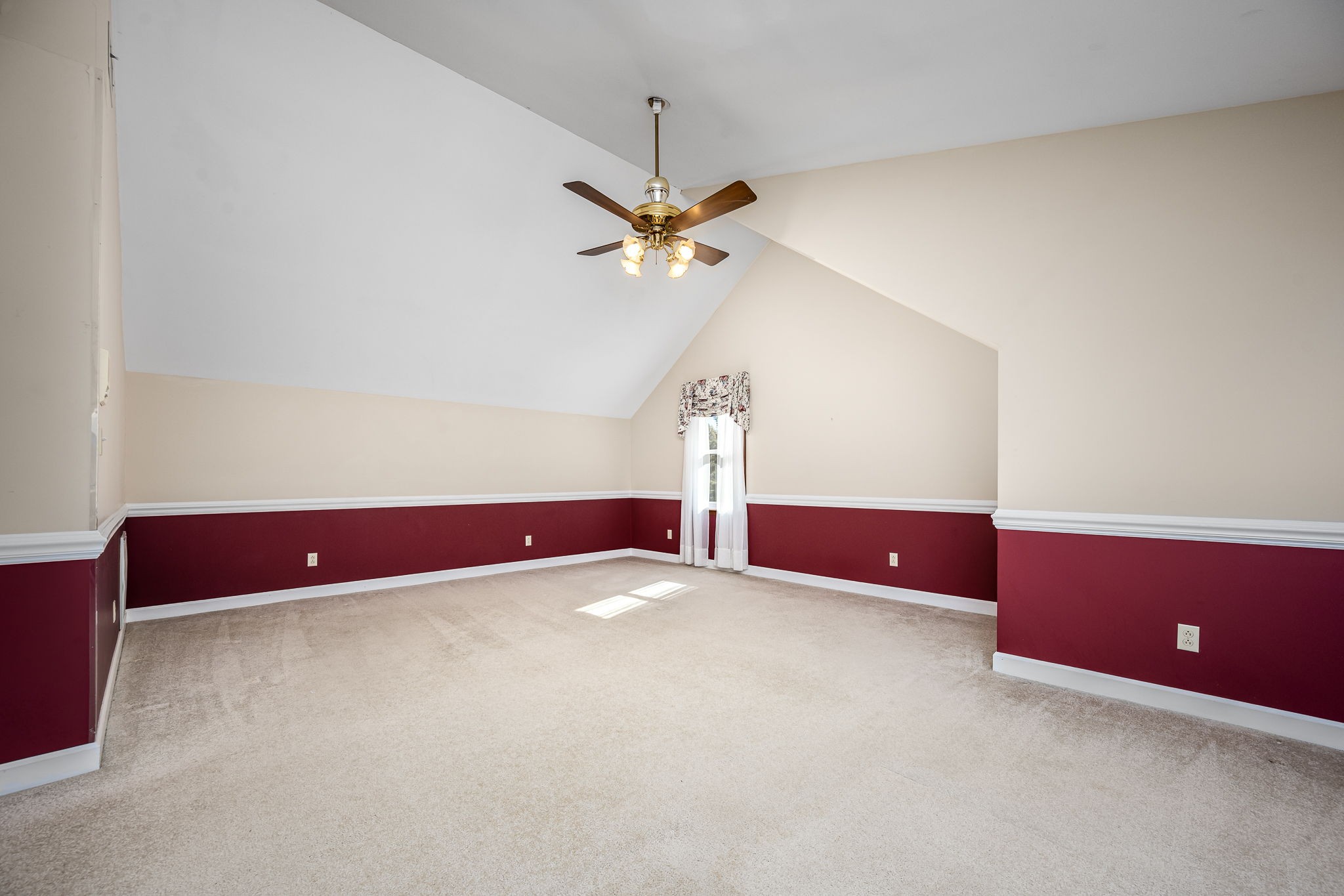 140 Motlow Road Tullahoma, TN 37388 - Photo 50 of 69 a view of an empty room with a ceiling fan