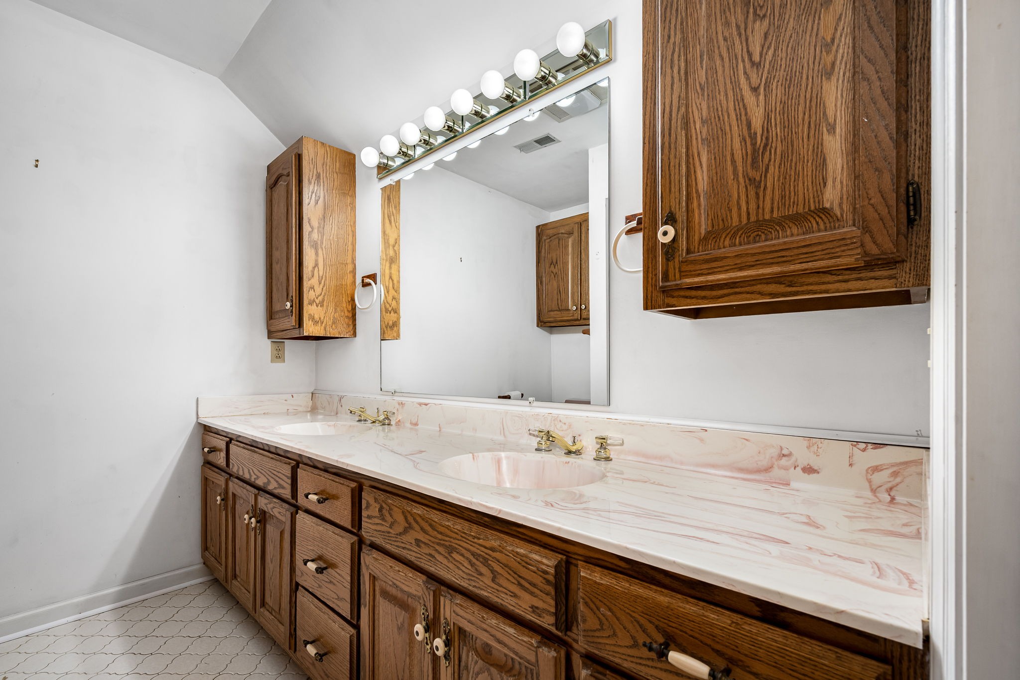 140 Motlow Road Tullahoma, TN 37388 - Photo 54 of 69 a bathroom with a granite countertop sink vanity and mirror