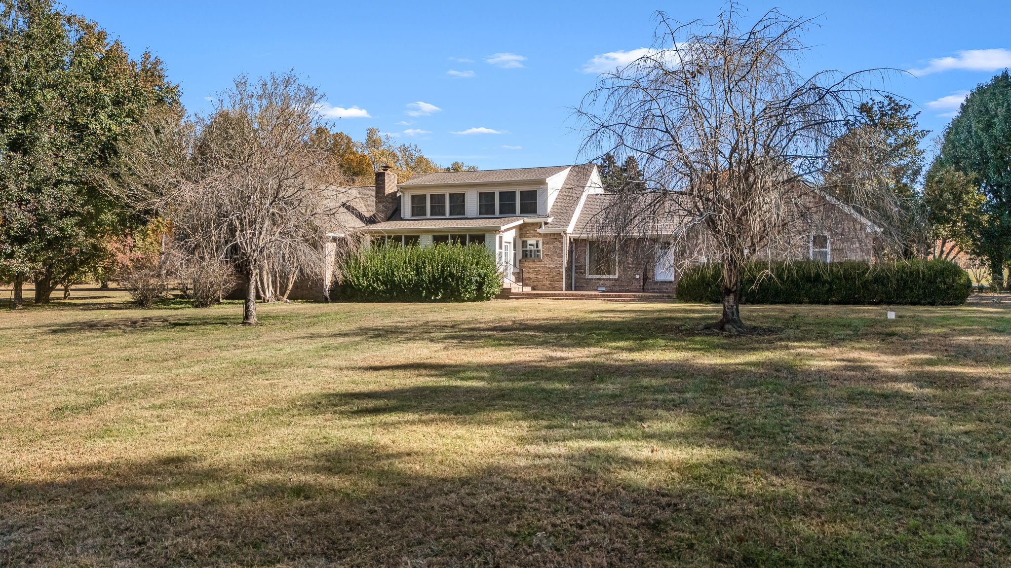 140 Motlow Road Tullahoma, TN 37388 - Photo 58 of 69 a building with trees in front of it