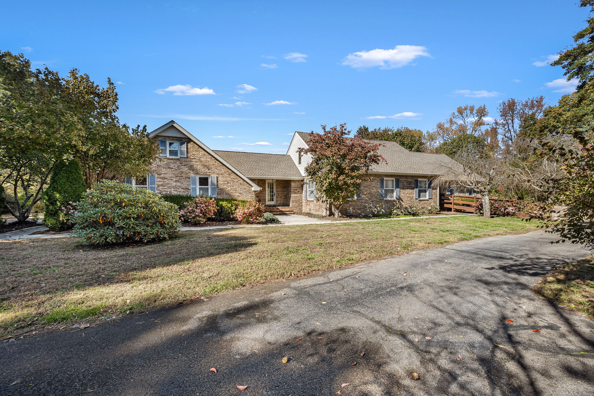 140 Motlow Road Tullahoma, TN 37388 - Photo 8 of 69 a view of an house with backyard and trees