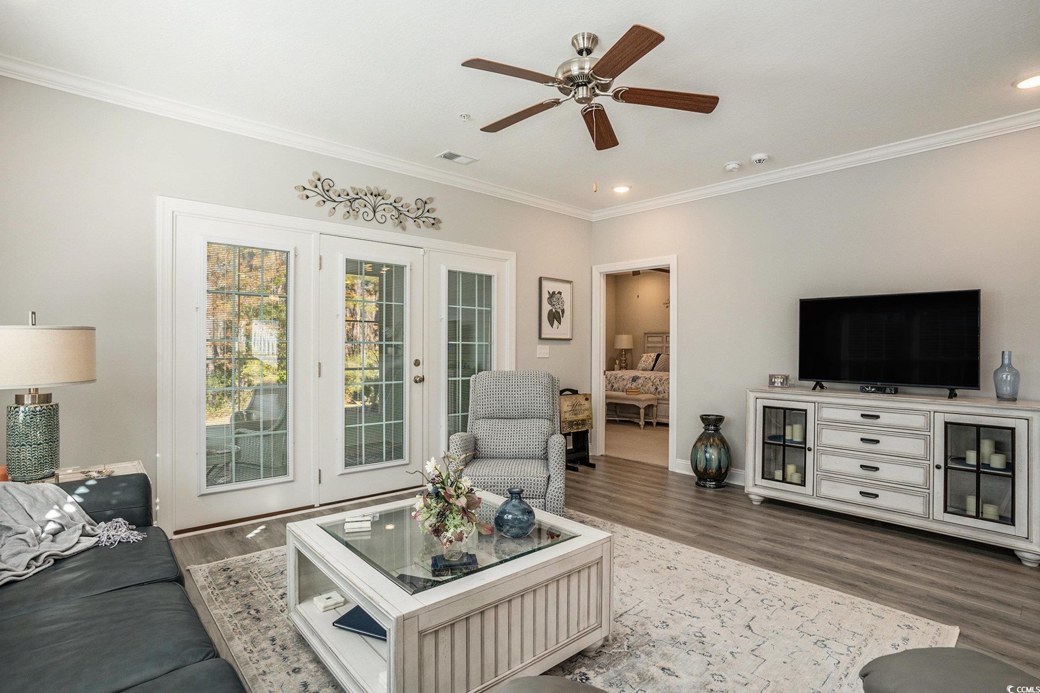 932 Jackline Place, Unit 101 Murrells Inlet, SC 29576 - Photo 11 of 40 Living room featuring ornamental molding, dark wood-style floors, a ceiling fan, and recessed lighting