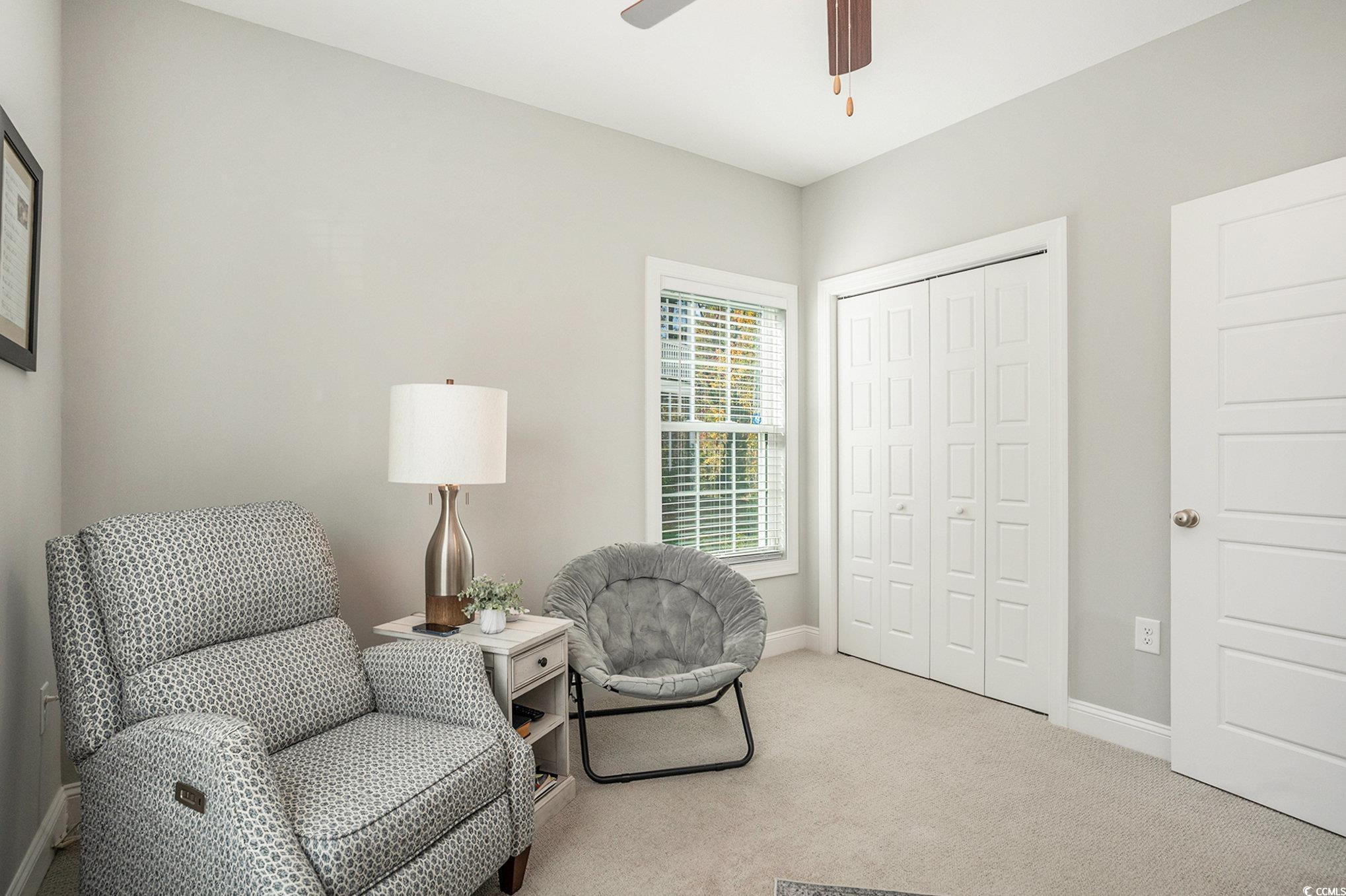 932 Jackline Place, Unit 101 Murrells Inlet, SC 29576 - Photo 26 of 40 Bedroom with light carpet and a ceiling fan