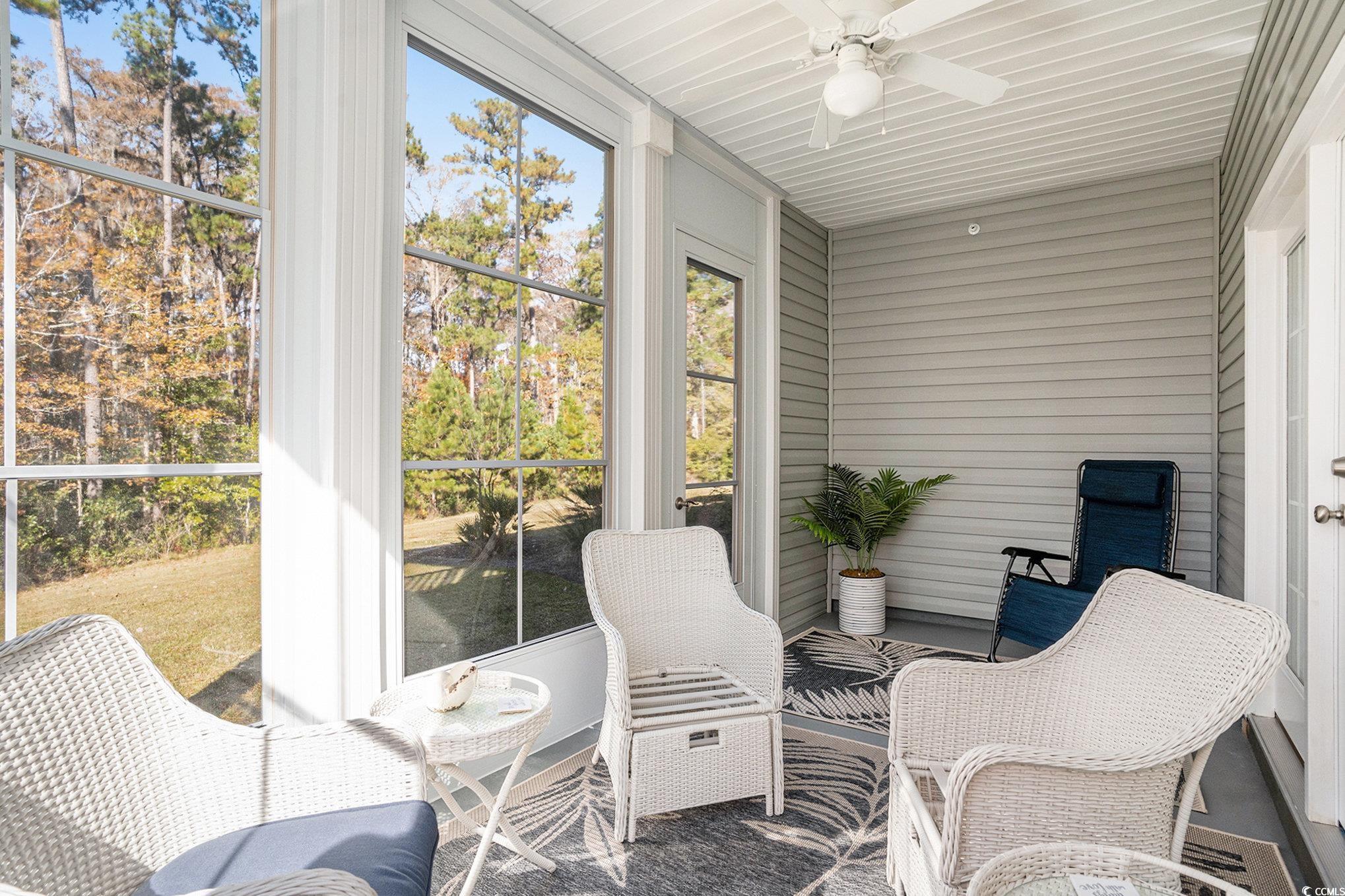 932 Jackline Place, Unit 101 Murrells Inlet, SC 29576 - Photo 31 of 40 Sunroom / solarium with a ceiling fan