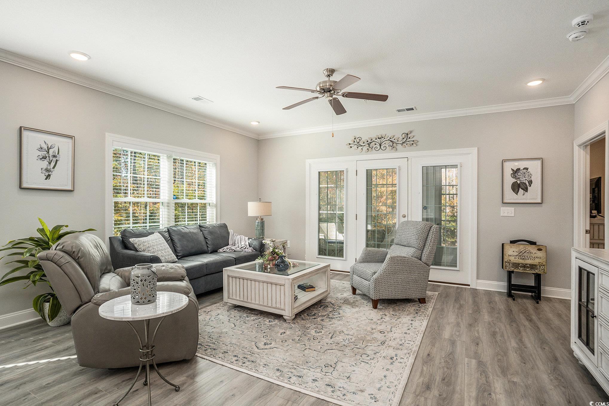 932 Jackline Place, Unit 101 Murrells Inlet, SC 29576 - Photo 10 of 40 Living room with ornamental molding, light wood-style floors, a ceiling fan, recessed lighting, and french doors