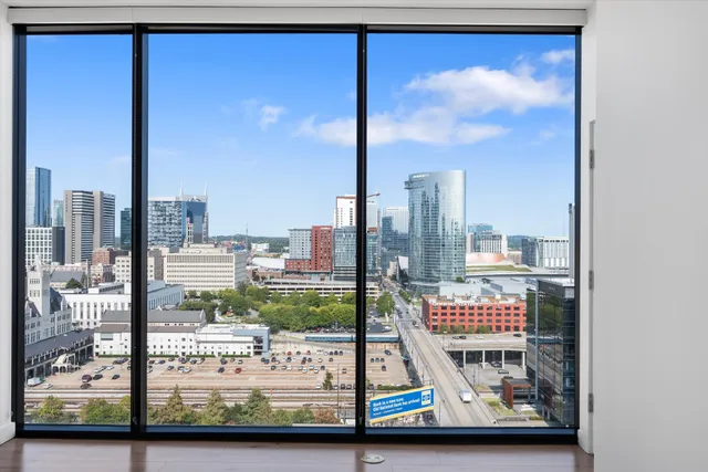 a bathroom with a double vanity sink and mirror
