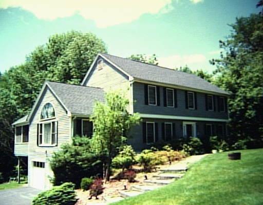 199 North Street Ridgefield, CT 06877 - Photo 1 of 1 a front view of a house with a yard