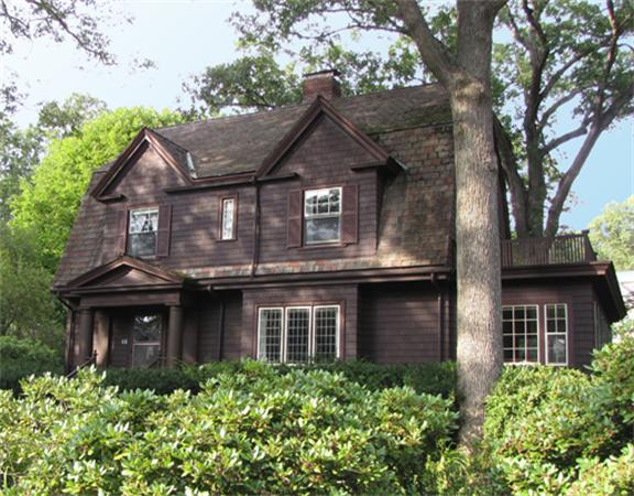 52 Livermore Road Wellesley, MA 02481 - Photo 1 of 9 a front view of a house with a garden