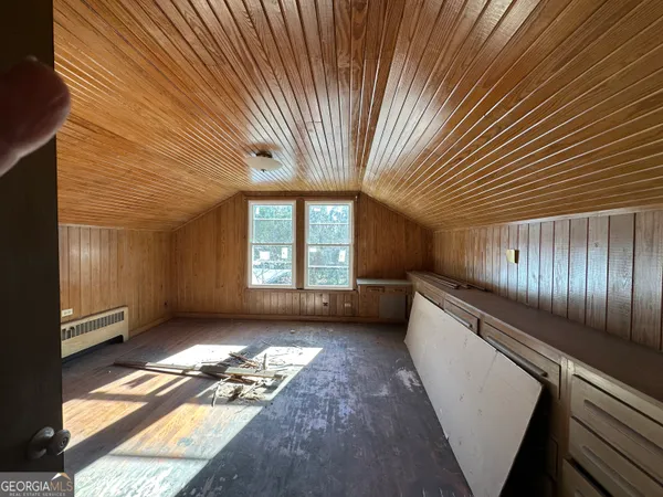 a bathroom with a sink and a window