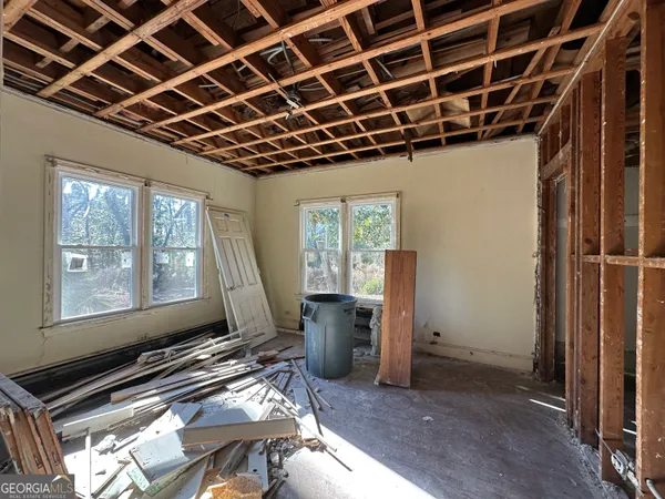 a view of entryway with wooden walls