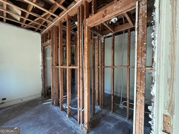 a view of a big room with windows