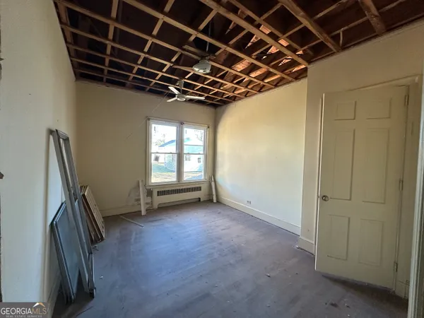 a room with furniture and a window
