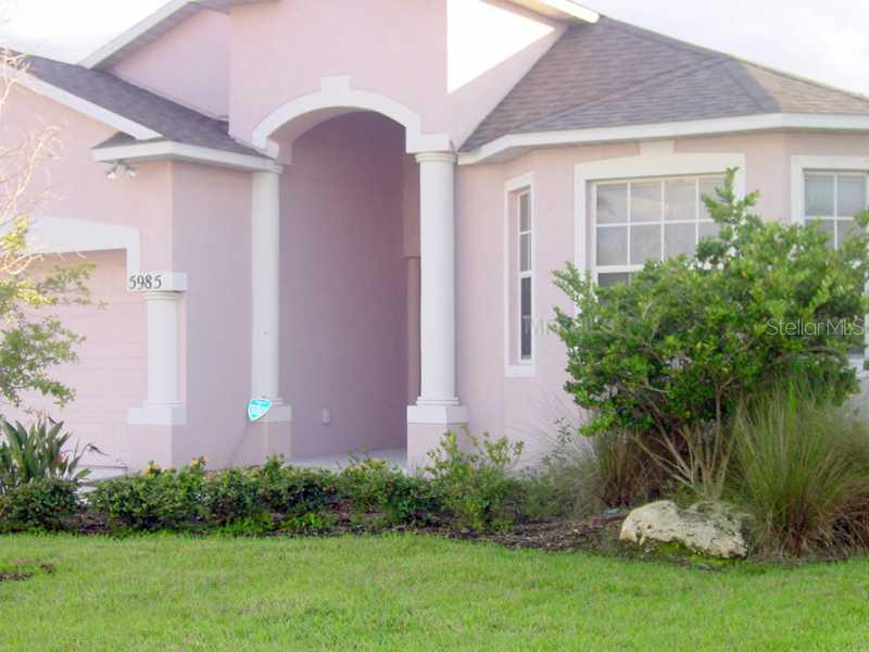 5985 Willows Bridge Loop Ellenton, FL 34222 - Photo 1 of 1 a front view of a house with garden