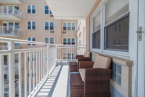 a view of a brick building outdoor seating