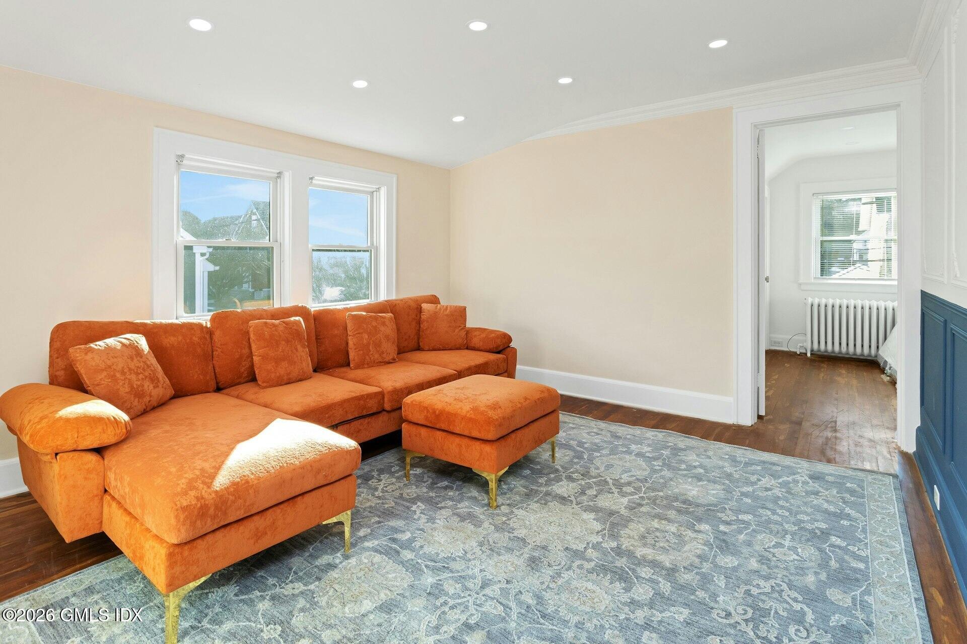 71 Prospect Street, Unit 2 Greenwich, CT 06830 - Photo 6 of 17 a living room with furniture and a window