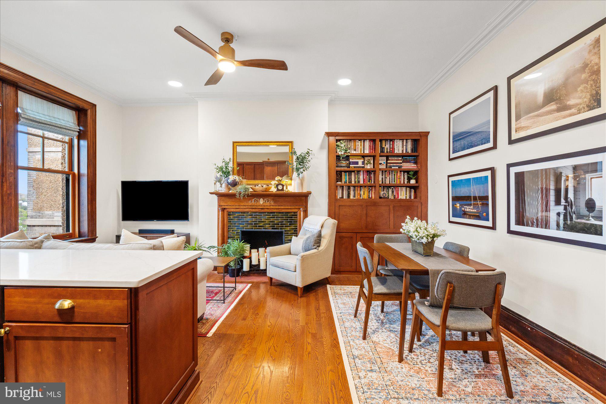 2853 Ontario Road Northwest, Unit 609 Washington, DC 20009 - Photo 5 of 14 a living room with furniture and a flat screen tv