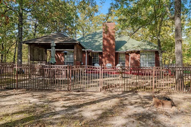 a view of a trees with a yard