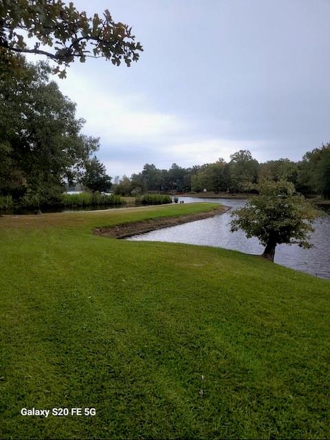 700 Hidden Lake Drive Powderly, TX 75473 - Photo 28 of 32 a view of an ocean and beach