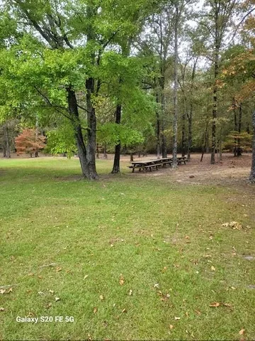 a view of a backyard of a house