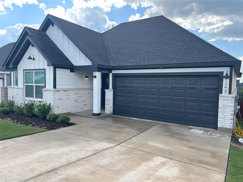 248 Lone Cedar Road Marble Falls, TX 78654 - Photo 2 of 32 a house view with a outdoor space