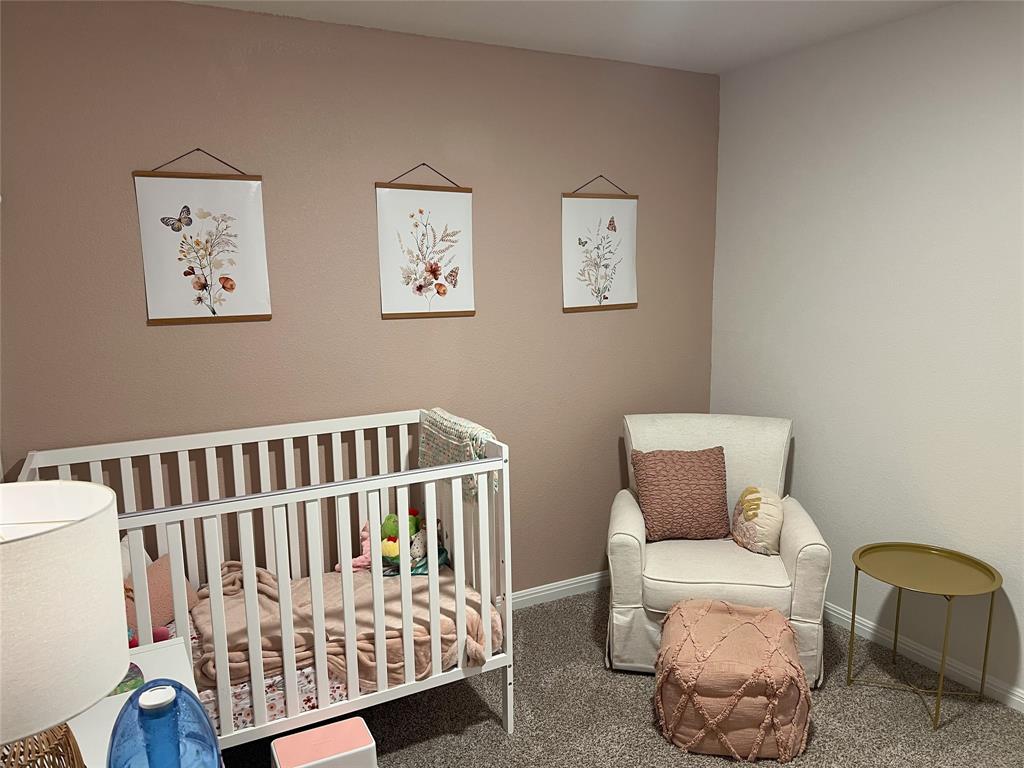 248 Lone Cedar Road Marble Falls, TX 78654 - Photo 27 of 32 a bedroom with furniture and a window