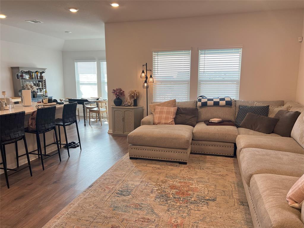 248 Lone Cedar Road Marble Falls, TX 78654 - Photo 6 of 32 a living room with furniture wooden floor and a table