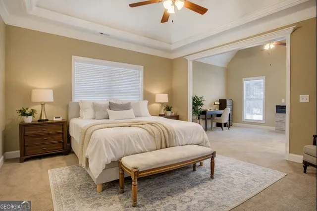 a view of a livingroom with furniture and a window