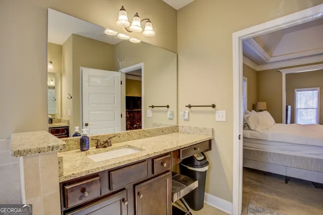 a bath tub sitting next to a shower