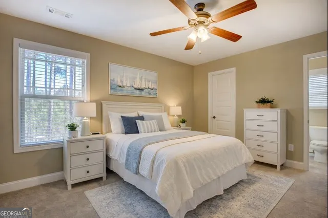 a view of a room with cabinet and windows