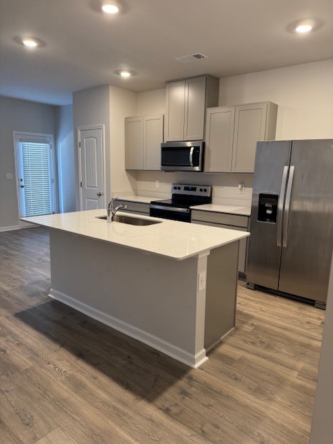255 Hazel Lane Lebanon, TN 37087 - Photo 3 of 12 a kitchen with stainless steel appliances a refrigerator sink and microwave
