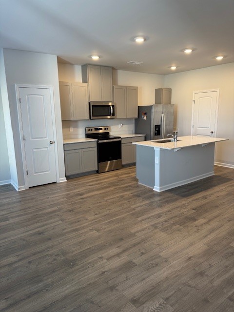 255 Hazel Lane Lebanon, TN 37087 - Photo 4 of 12 a kitchen with kitchen island granite countertop a sink counter top space stainless steel appliances and cabinets